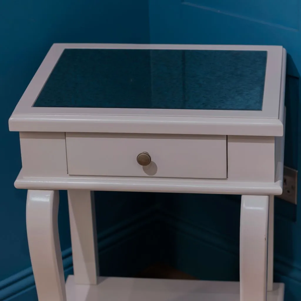Scroll Grey 1-Drawer Mirrored Top End Table by Tara Lane