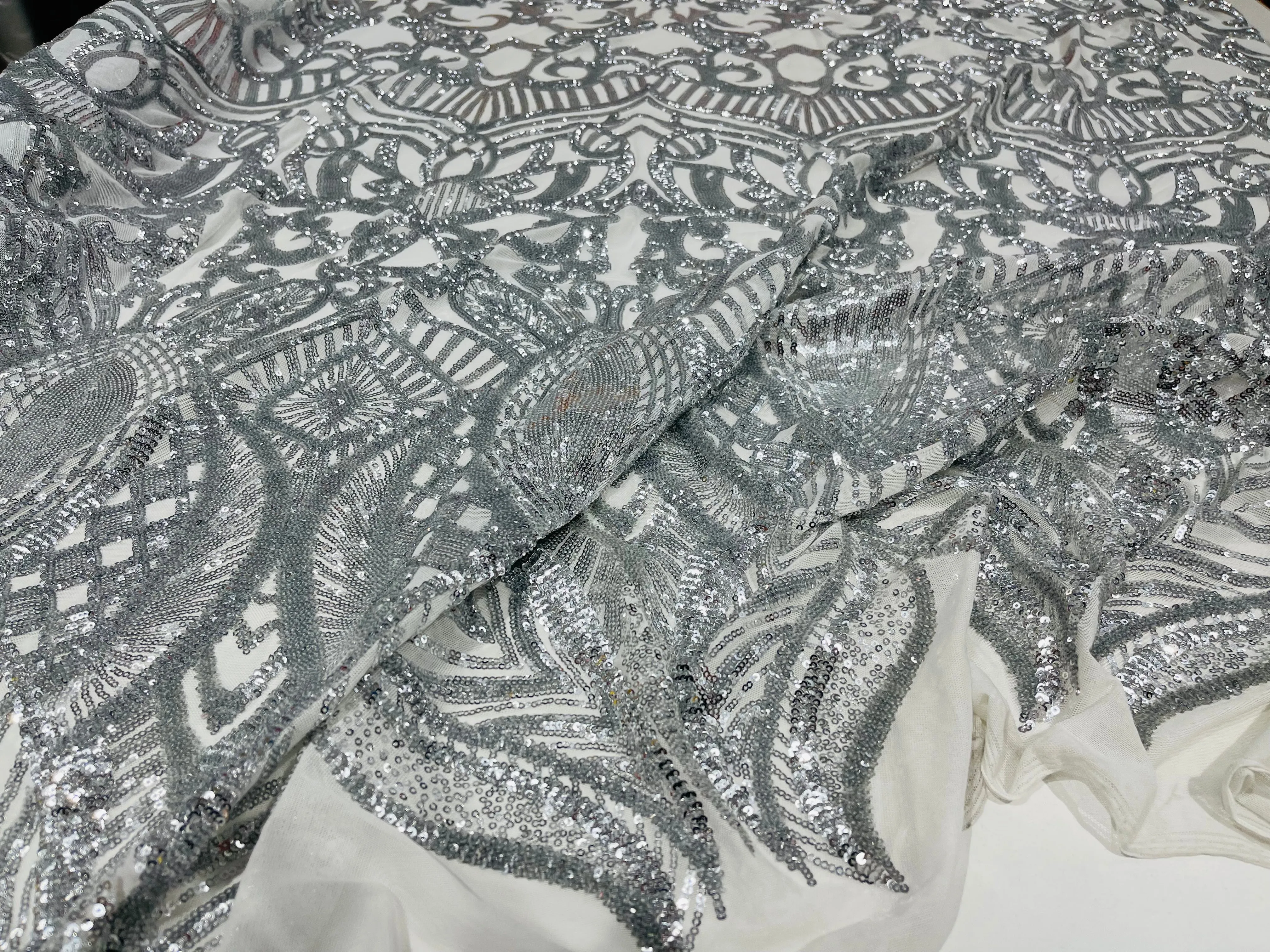 Silver royalty design on a white 4 way stretch mesh-prom-sold by the yard.