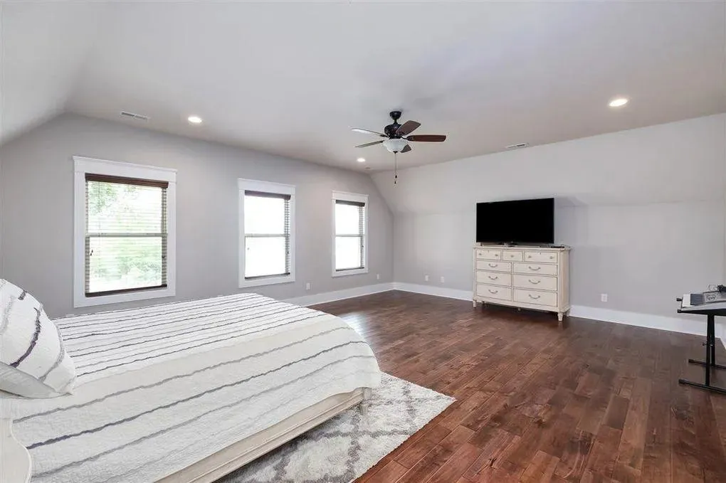 Spacious Family Home with Inviting Porches and Ample Garage Space