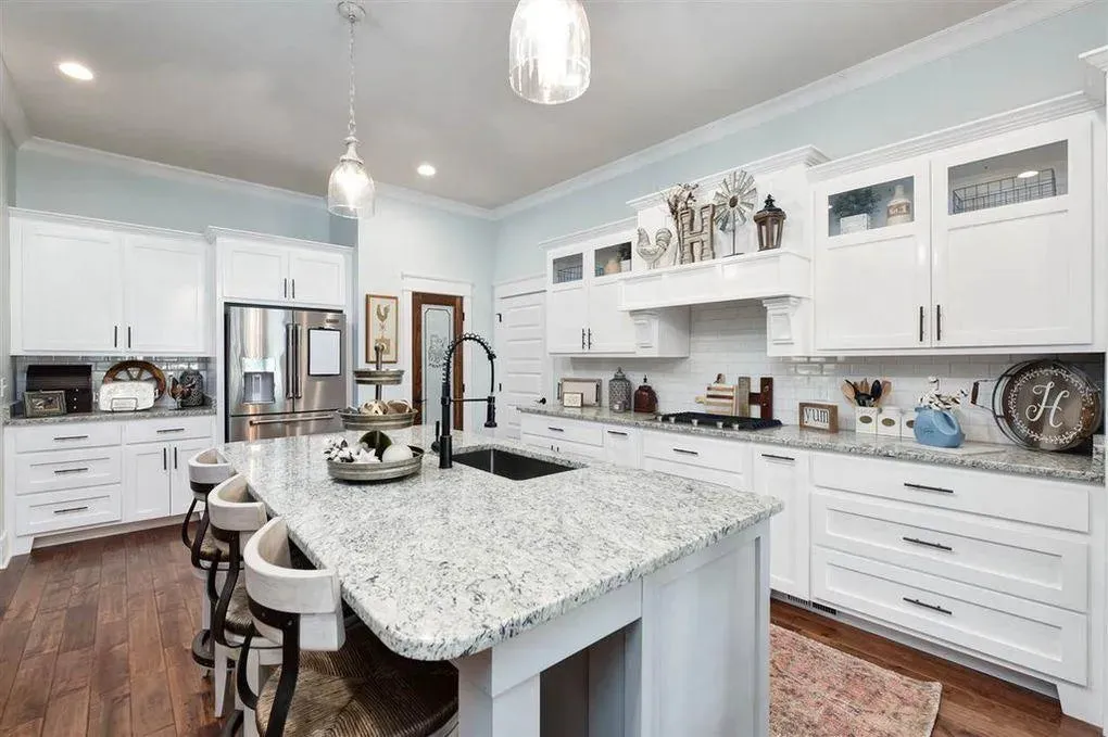 Spacious Family Home with Inviting Porches and Ample Garage Space