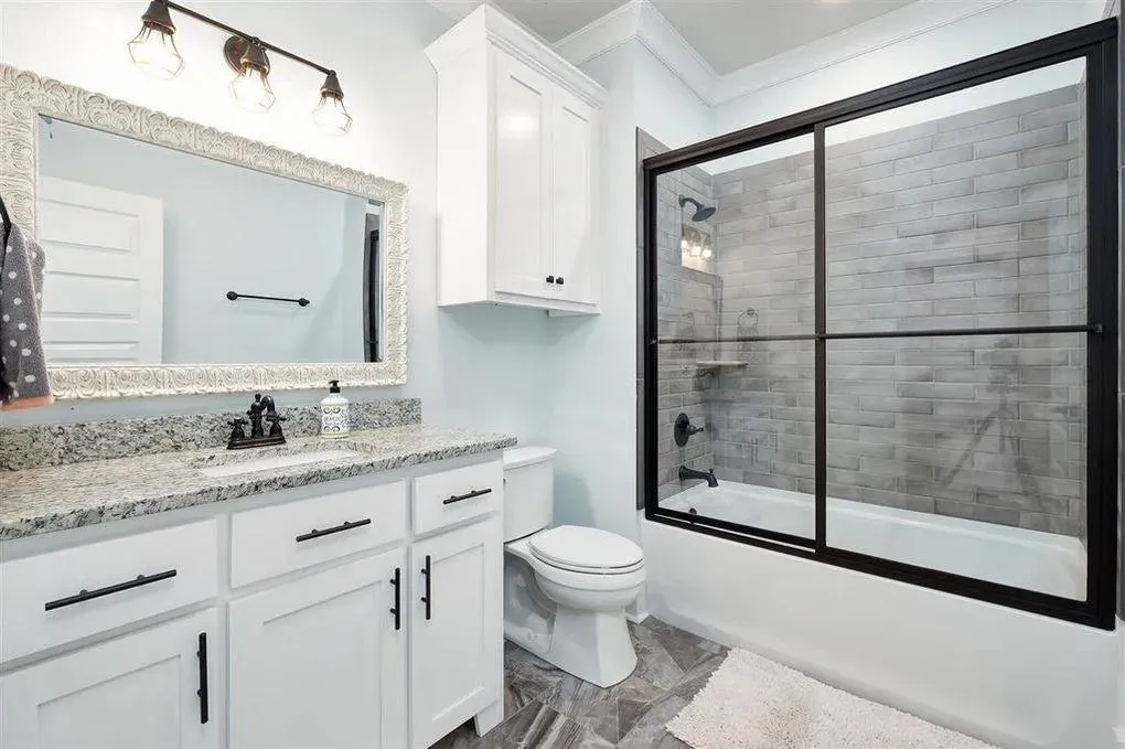 Spacious Family Home with Inviting Porches and Ample Garage Space