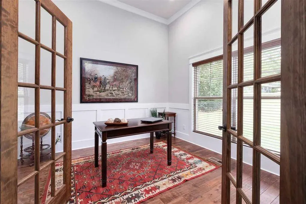 Spacious Family Home with Inviting Porches and Ample Garage Space