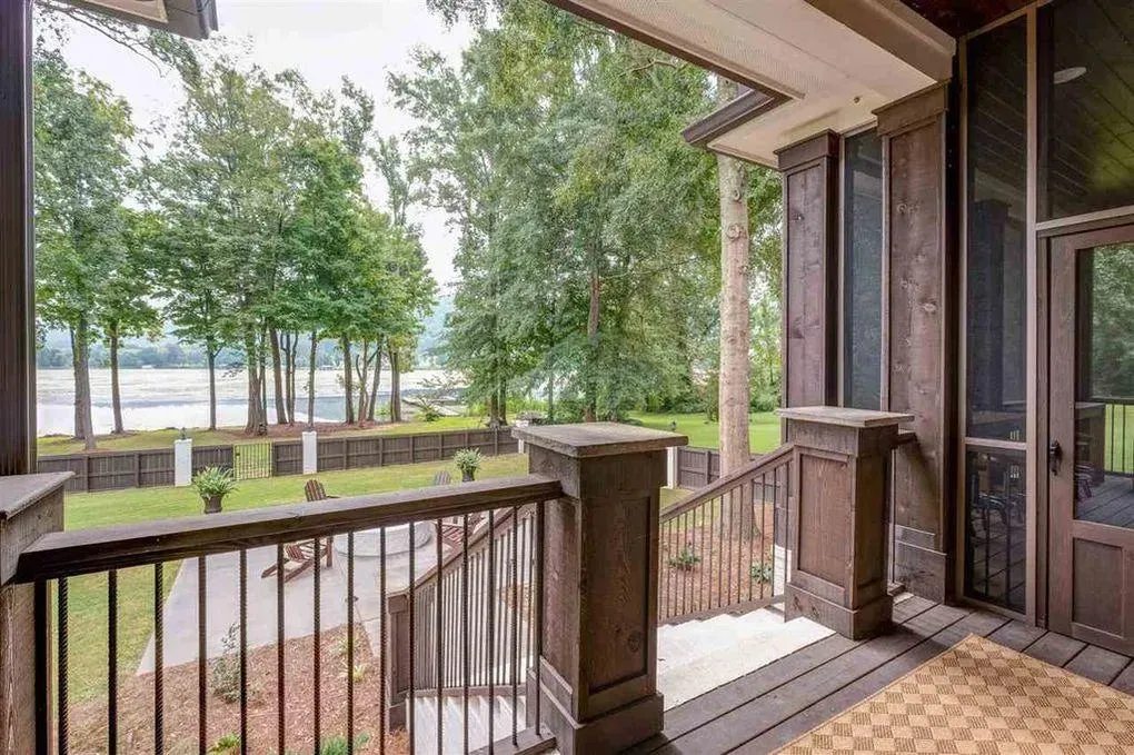 Spacious Family Home with Inviting Porches and Ample Garage Space