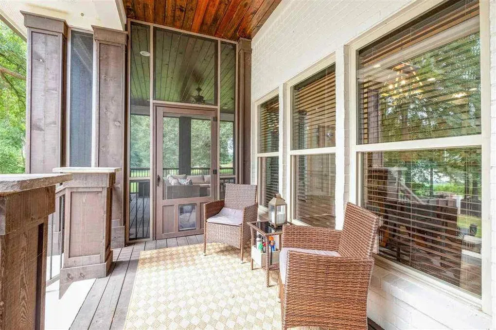 Spacious Family Home with Inviting Porches and Ample Garage Space