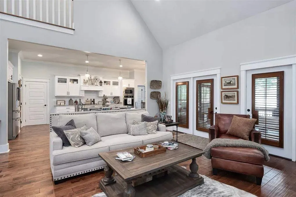 Spacious Family Home with Inviting Porches and Ample Garage Space