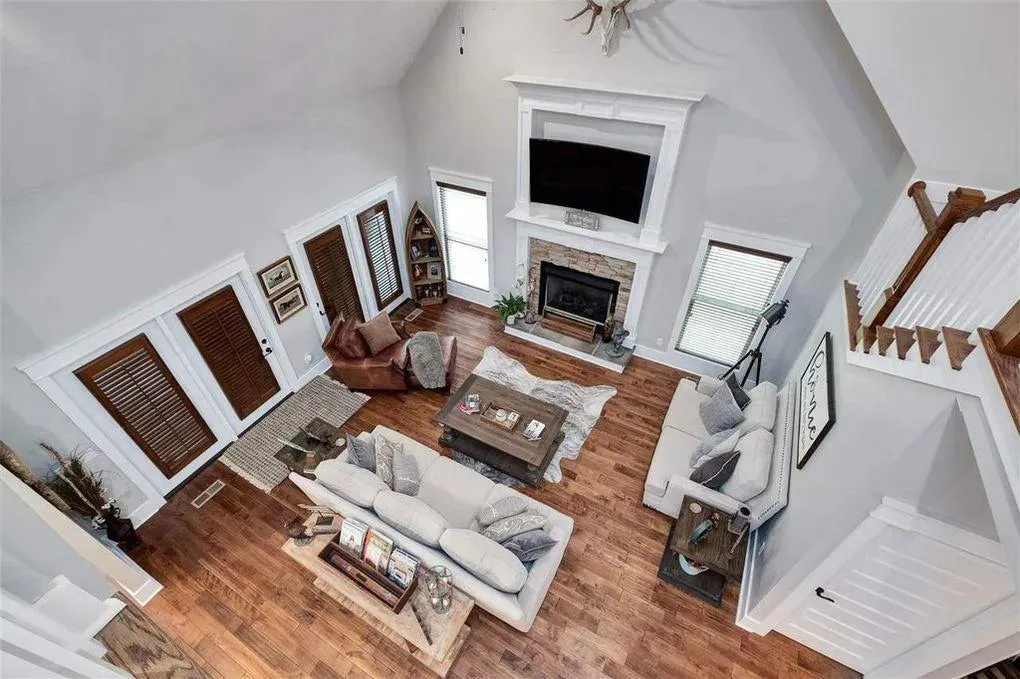 Spacious Family Home with Inviting Porches and Ample Garage Space